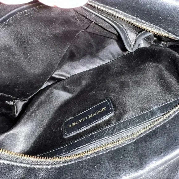 St. John Women's Black Leather Quilted Handbag
Purse Gold Tone hardware W/ Charm - Picture 10 of 16